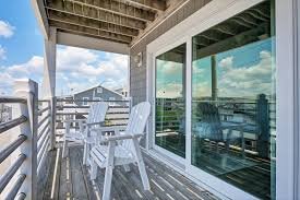 Sandpeddler Inn and Suites Deck Chairs on Porch